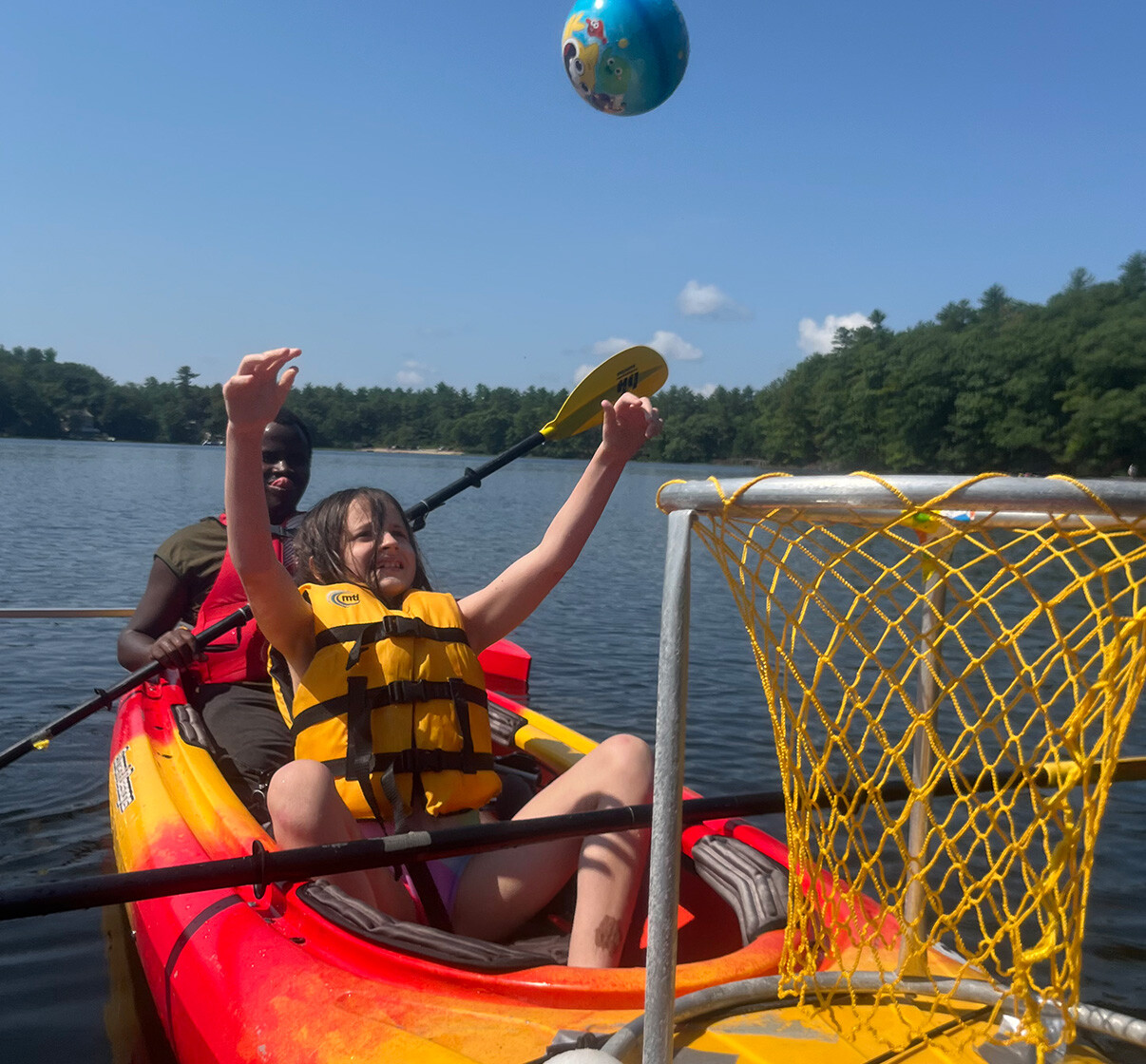 student kayaking 